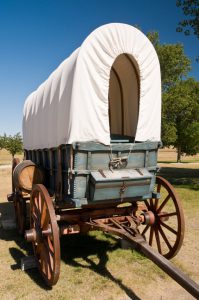 A restored covered wagon located at Fort Smith in eastern Wyoming.