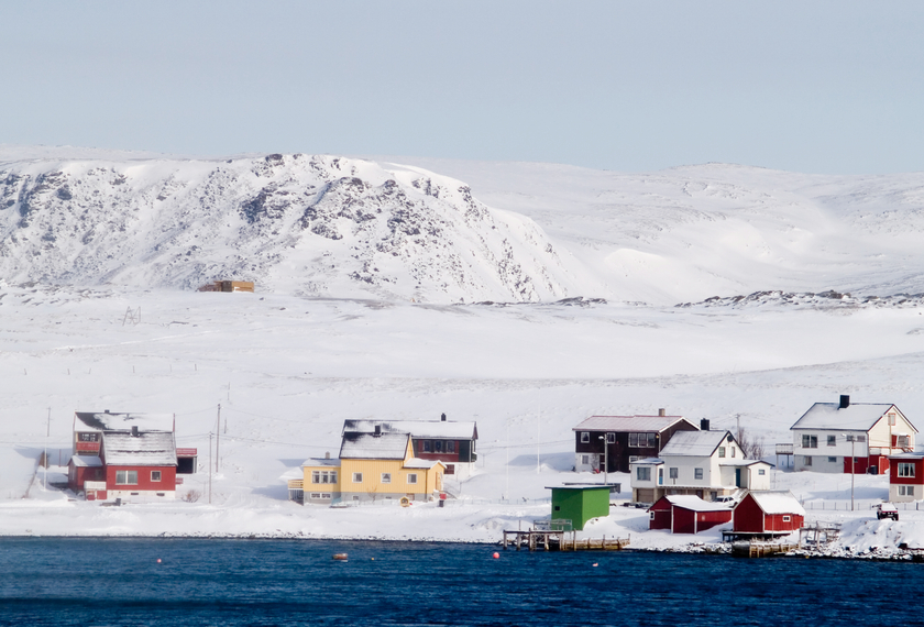 Houses by the Barents Sea in Norway's arctic region.
